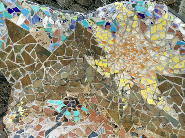 Mosaic Bench Second Detail showing freeze damage.
