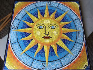 Artist Marie Powell's "Sun Compass" mosaic table top