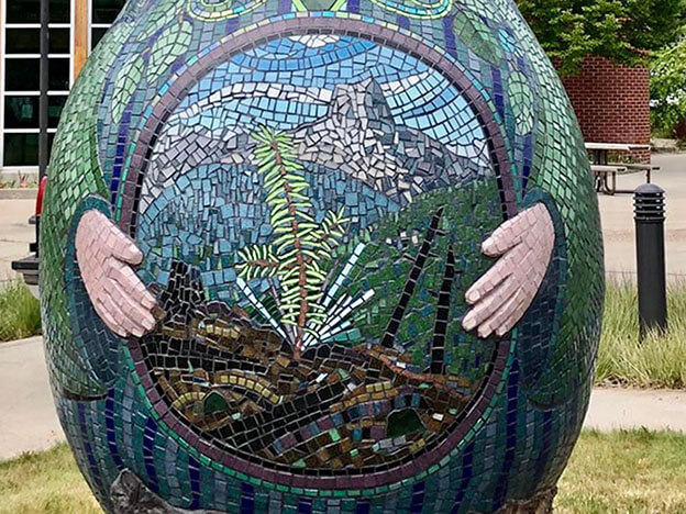 womb detail, Rebirth matryoshka mosaic sculpture by artist Peter Vogelaar