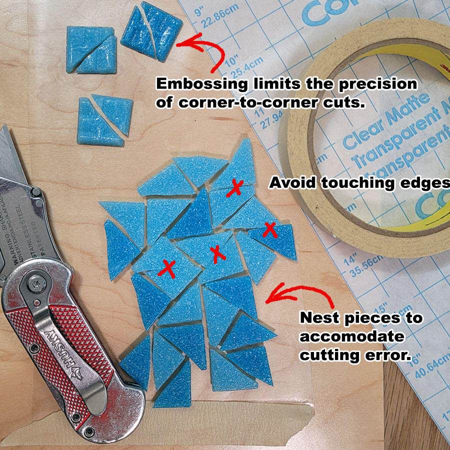 Embossing pattern on bottoms of tiles limit the precision of corner-to-corner cuts.