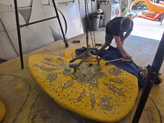 Lily Pad Mosaic Sculpture hoisted with gantry